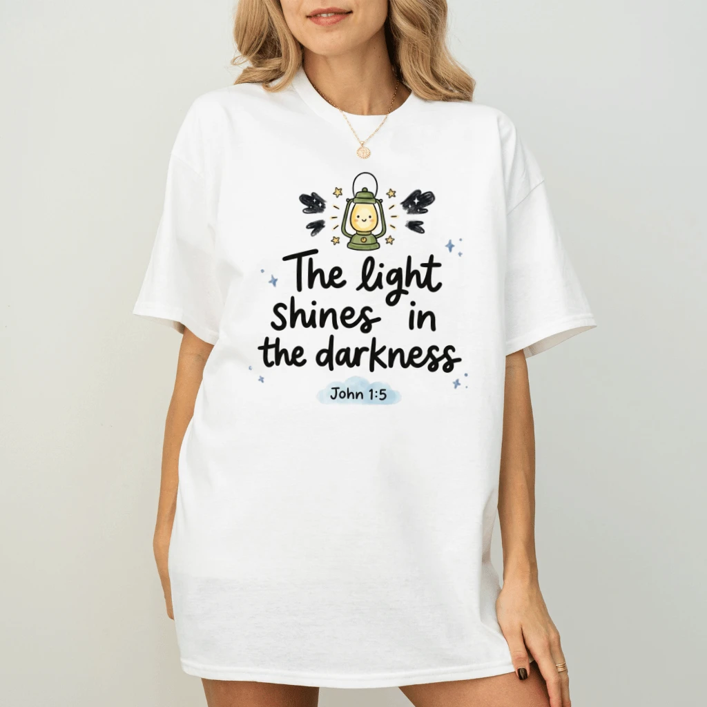 The Light Shines in the Darkness T-Shirt – Faith Gift for Christians, John 1:5 Bible Verse Church Outfit Tee - back view