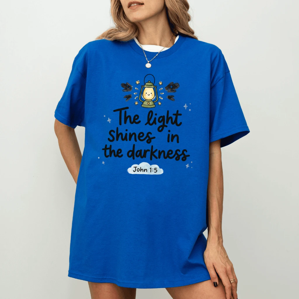 The Light Shines in the Darkness T-Shirt – Faith Gift for Christians, John 1:5 Bible Verse Church Outfit Tee - detail view