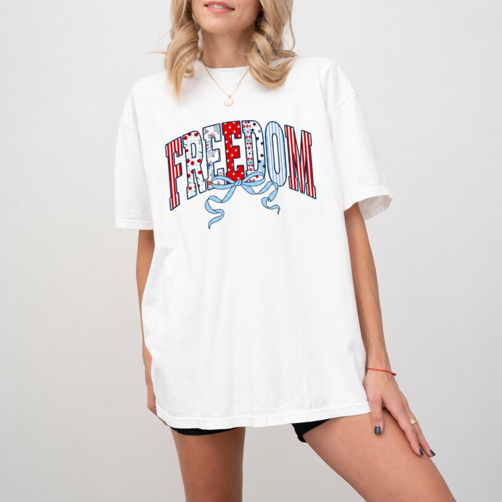 Comfort Colors Red White Blue Stripes and Coquette Bow USA Freedom Shirt - Cute Patriotic Freedom Gift for women - detail view