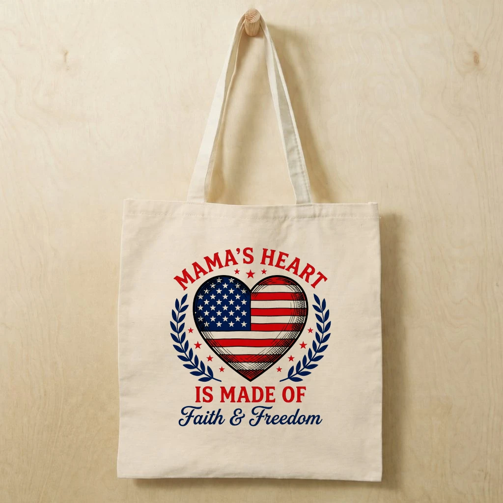 Mama's Heart Is Made Of Faith & Freedom Cotton tote bag - 4th of July USA Flag Heart Tote Bag - Cute Patriotic Gift for Mama - front view