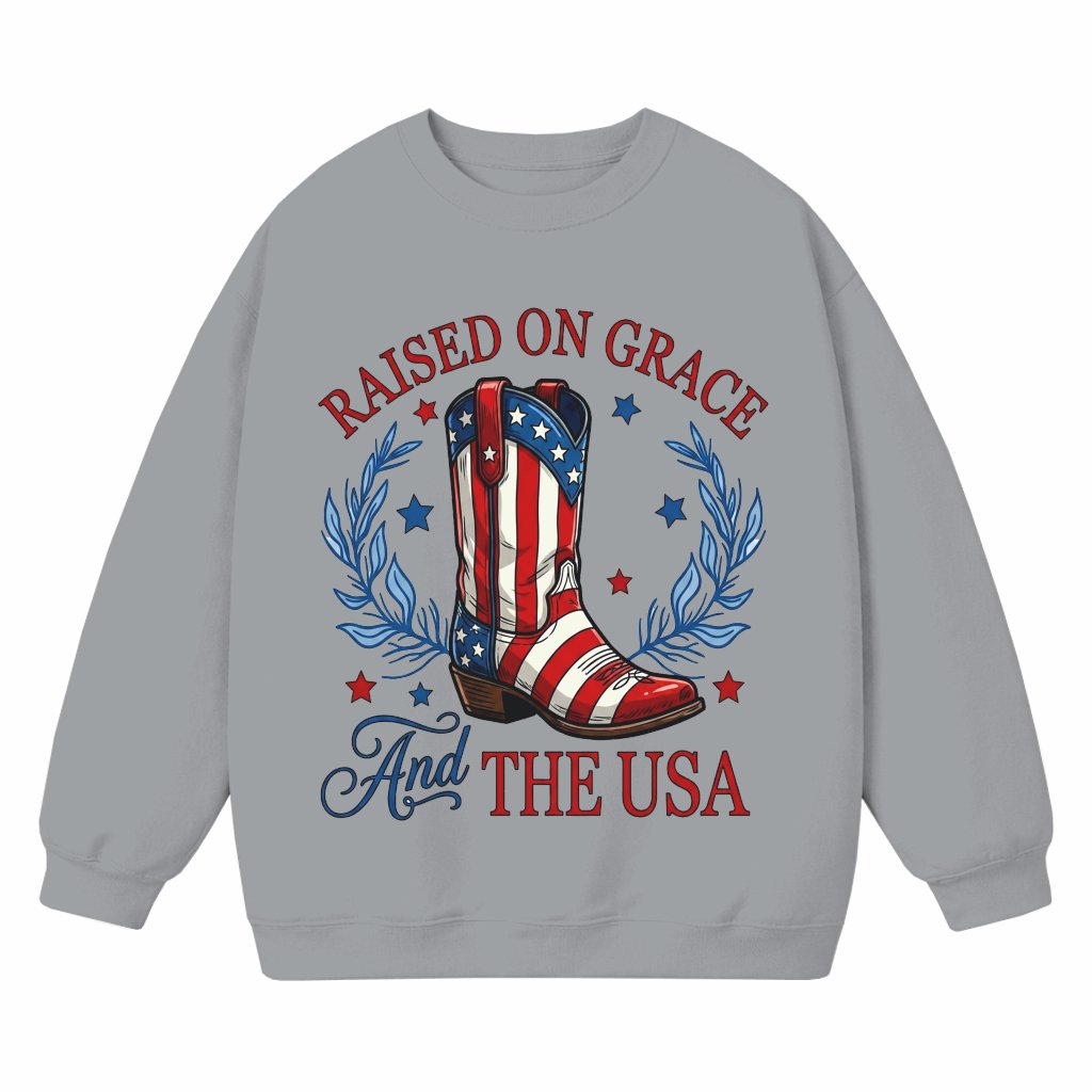 Raised on Grace and the USA Patriotic Cowgirl Boots Sweatshirt - USA Flag Boots Shirt - 4th of July Patriotic Gift for Cowgirl Lovers - front view