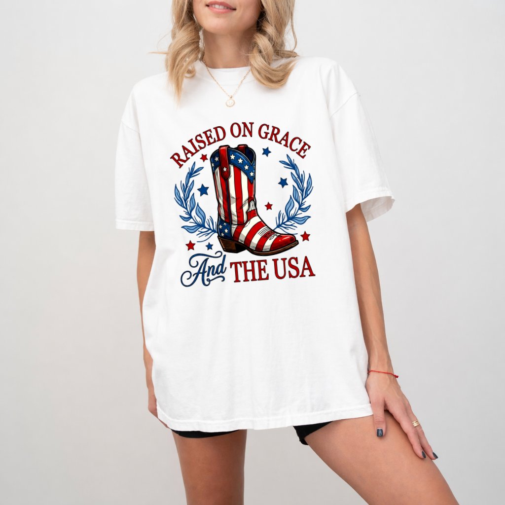 Comfort Colors Raised on Grace and the USA Patriotic Cowgirl Boots Shirt - USA Flag Boots Shirt - 4th of July Patriotic Gift for Cowgirl Lovers - detail view