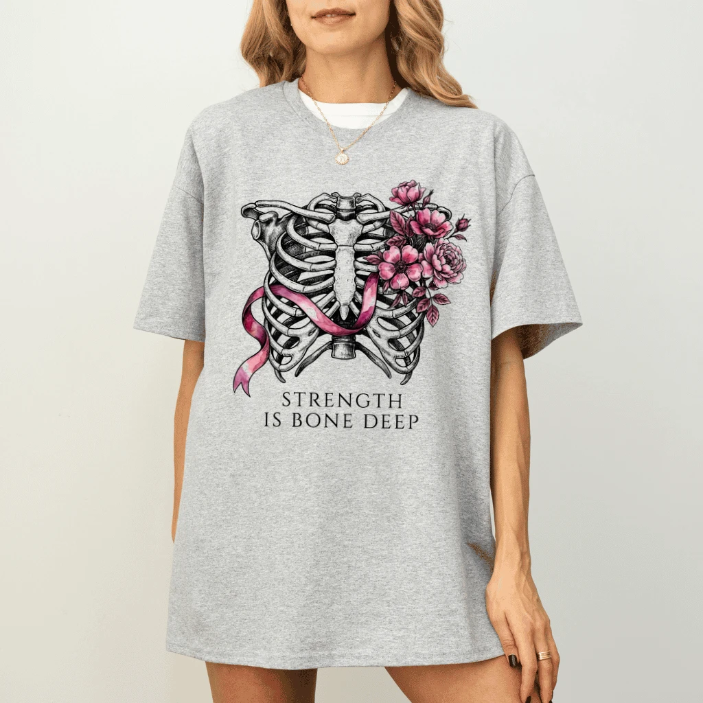 Strength Is Bone Deep Breast Cancer T-shirt | Skeleton Ribcage Pink Ribbon Gift for Cancer Survivor Fighter - detail view